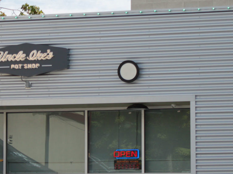 Uncle Oke's Pot shop store front with an open sign